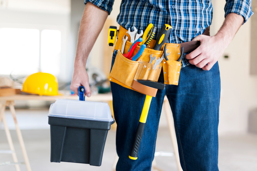 Center part male construction worker