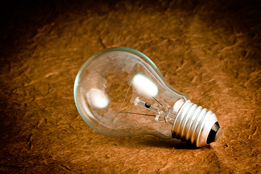 Center close up shiny light bulb